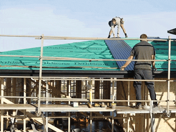 An animated gif of a roof being installed